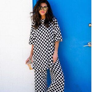 Dressed in LALA Lex Ribbed Playsuit in Black + White Checkerboard